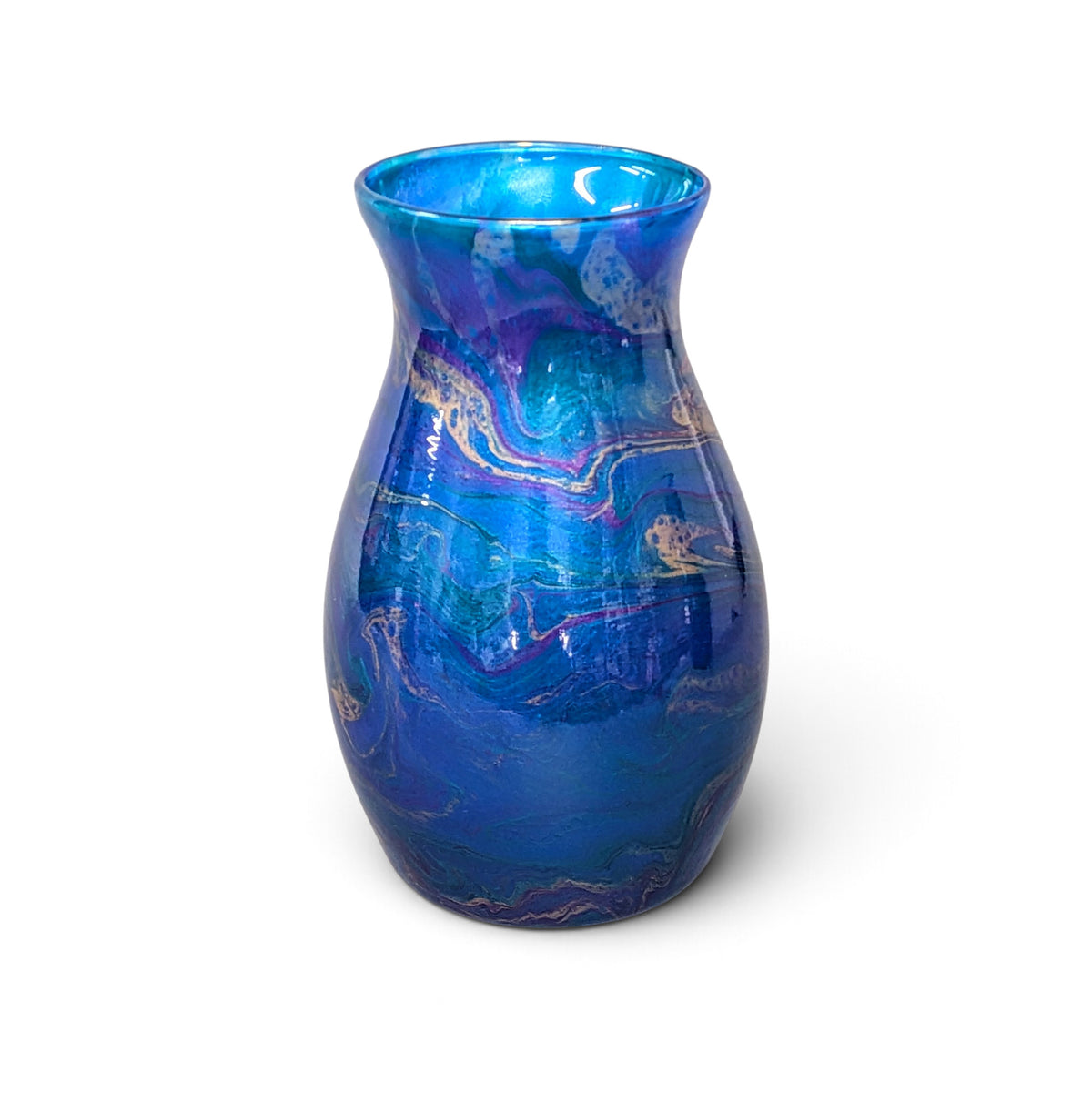 A small hand-blown glass vase with a vibrant blue and purple marbled pattern, featuring swirling veins of gold and pink, set against a plain white background.